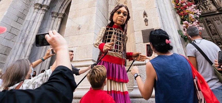 Giant puppet of Syrian refugee girl makes stop at St. Patrick's Cathedral