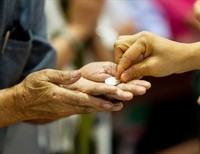 Are We Desecrating the Body of Christ By Receiving the Eucharist in Our Hands?